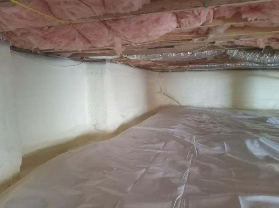 Crawl space encapsulation with closed-cell spray foam for Flat Roof Repair in Champlin